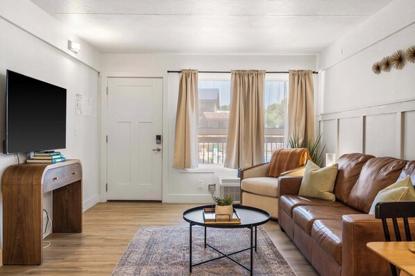 Condo, 1 King Bed, Kitchen (Poolside Near the Landing) | Living area | 42-inch flat-screen TV with digital channels