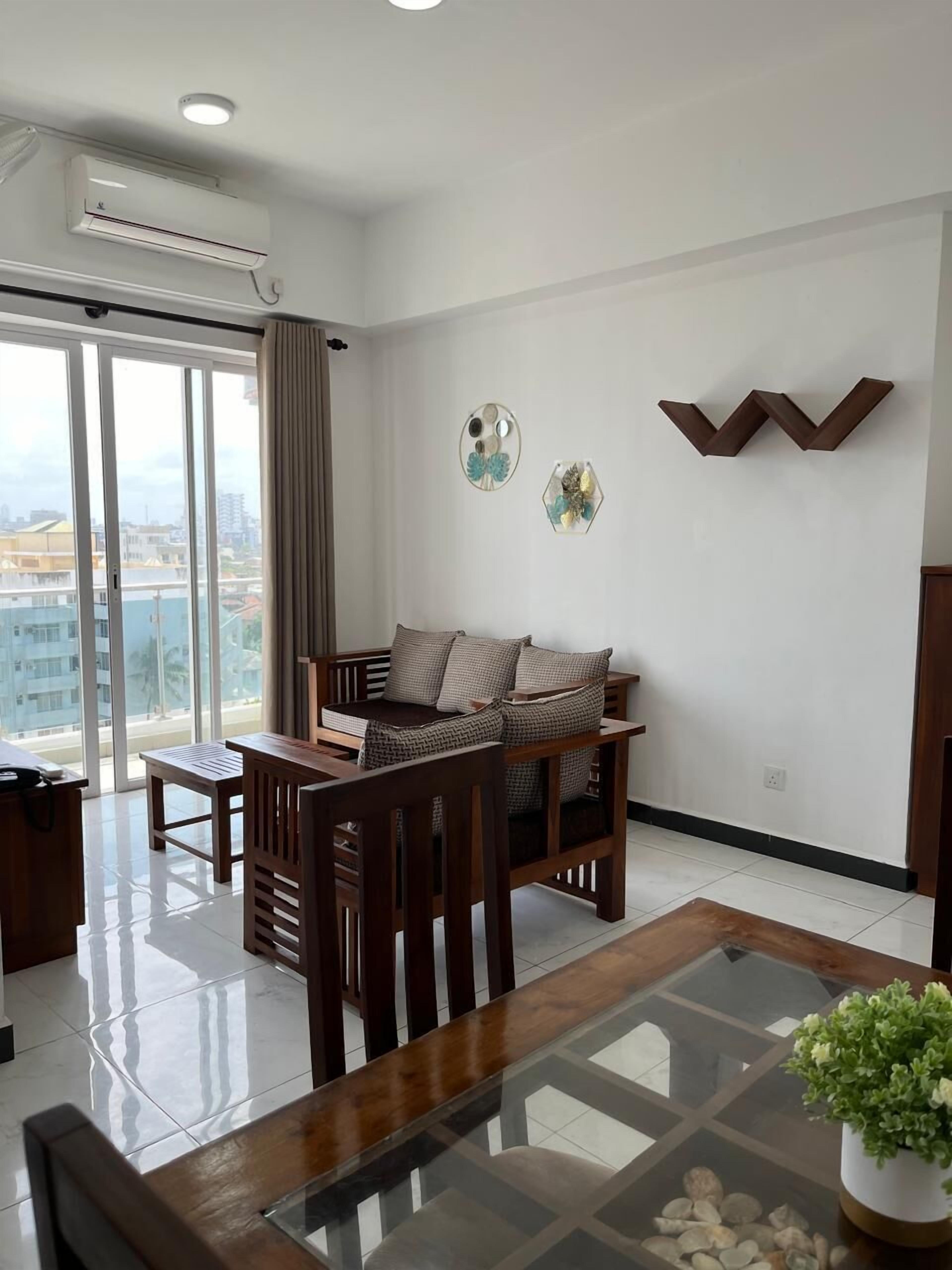 Apartamento, balcón, vistas al mar | Zona de estar | Una televisión de pantalla plana