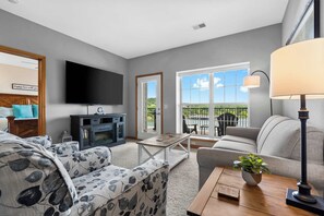 Condo, Multiple Beds, Balcony (Waters Edge Retreat) | Living area | 42-inch flat-screen TV with digital channels