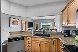 Condo, Multiple Beds, Balcony (Waters Edge Retreat) | Private kitchen | Fridge, microwave, oven, stovetop