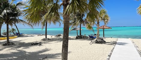 On the beach, sun-loungers, beach towels