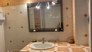 Hair dryer, towels, soap, toilet paper