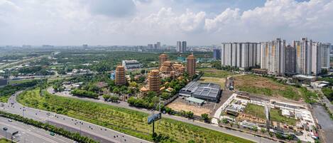 A modern urban area with a mix of traditional pagoda-style buildings and high-rise residential buildings.