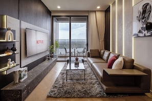 Familienapartment, Balkon | Wohnbereich