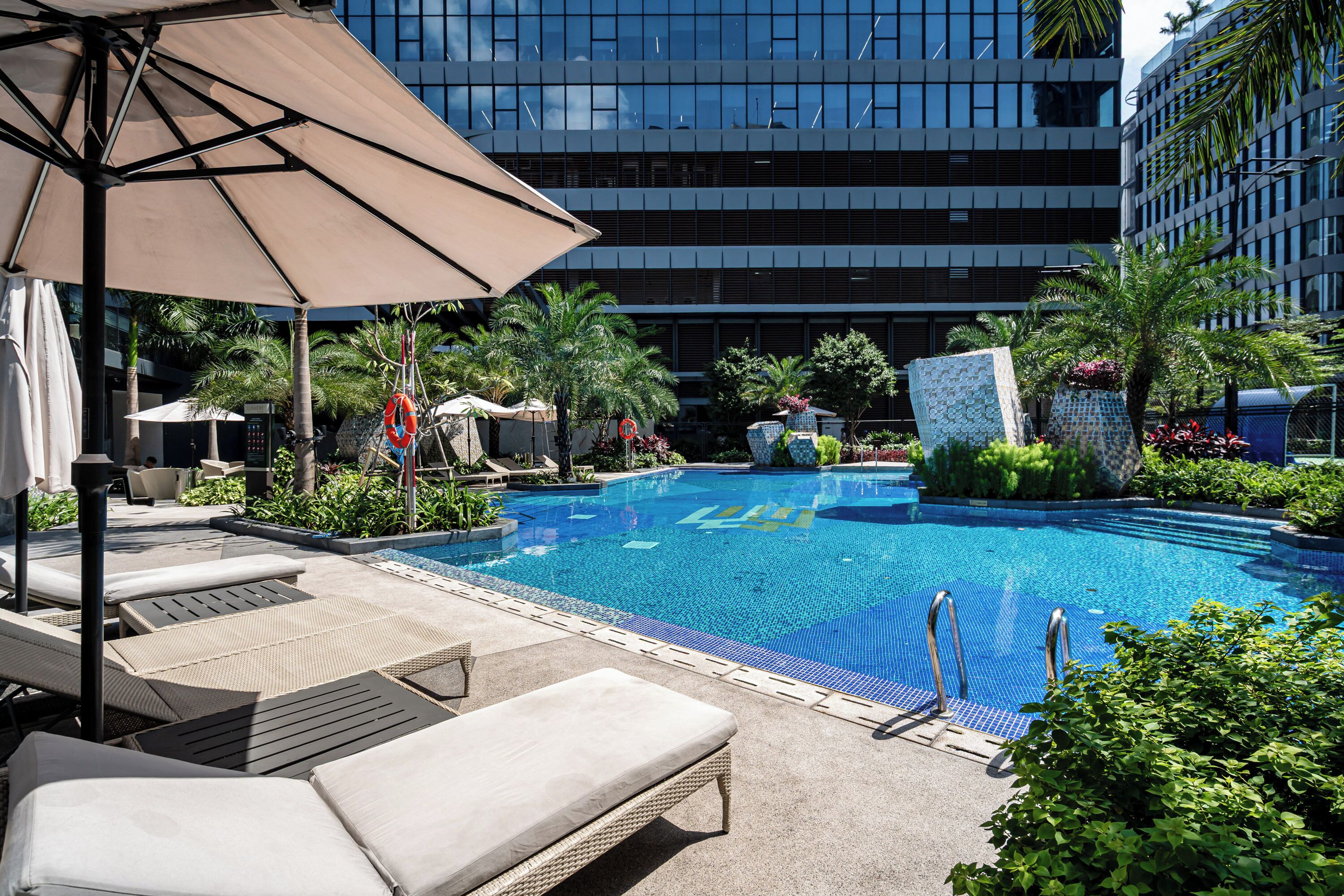 Outdoor pool, pool umbrellas, pool loungers