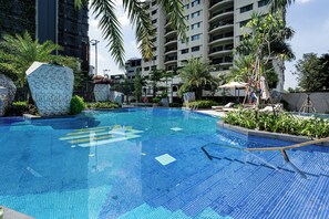 Outdoor pool, pool umbrellas, pool loungers