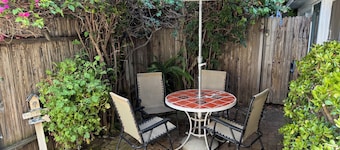 Enchanting Garden Cottage Apt Near Beach