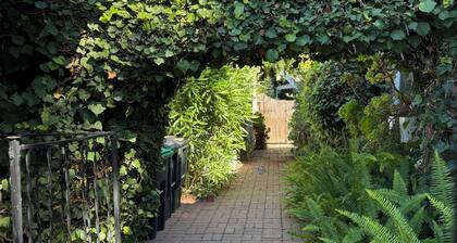 Enchanting Garden Cottage Apt Near Beach