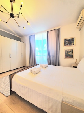 2 chambres, fer et planche à repasser, Wi-Fi, draps fournis