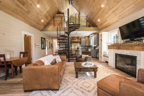 Télévision, cheminée, chaîne hi-fi, espaces bureaux