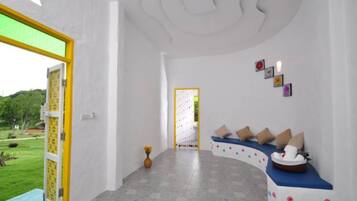 Triple Room, Garden View | Desk, free WiFi