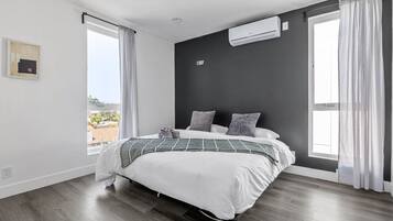 2 bedrooms, desk, iron/ironing board, travel crib