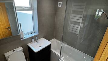 Hair dryer, towels, toilet paper