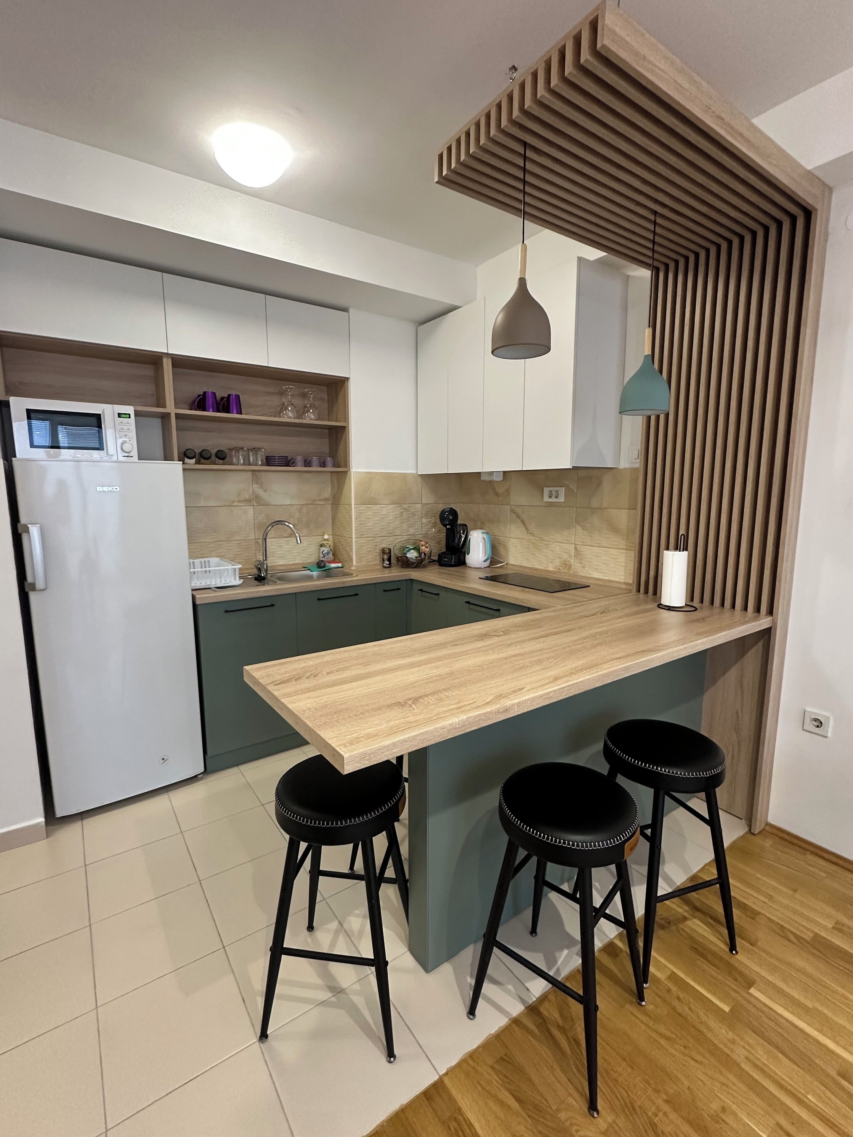 Fridge, microwave, stovetop, coffee/tea maker