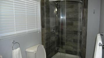 Shower, towels, toilet paper