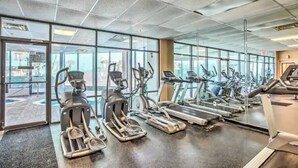 A gym with treadmills, elliptical machines, and stationary bikes. - Destination Ocean, Unobstructed Oceanfront Suite with a King Bed (Myrtle Beach)