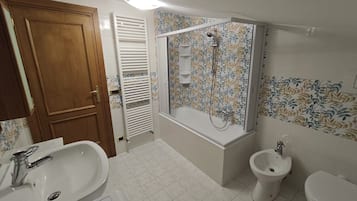 Hair dryer, bidet, towels, soap