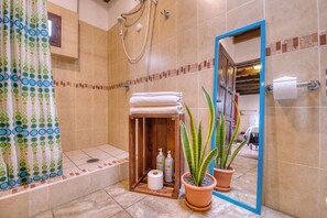Shower, hair dryer, towels, soap