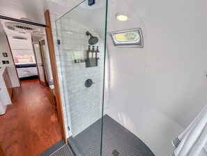 Shower, hair dryer, towels, soap