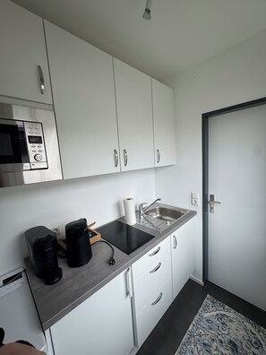 Microondas, placa de cocina