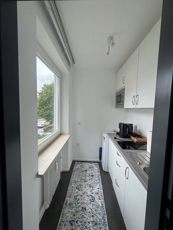 Microondas, placa de cocina