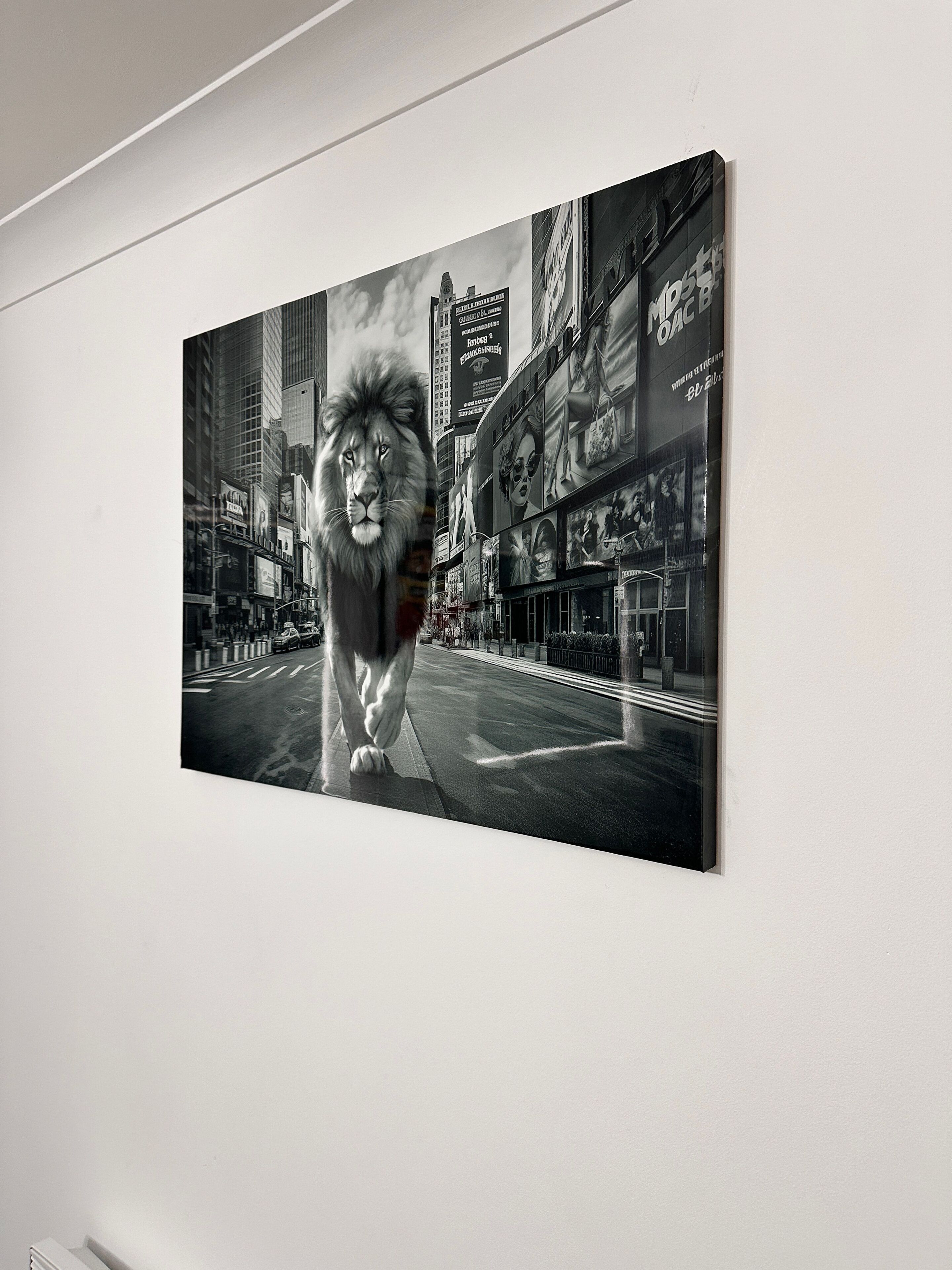 A large black and white photograph of a lion's face superimposed on a city street scene.