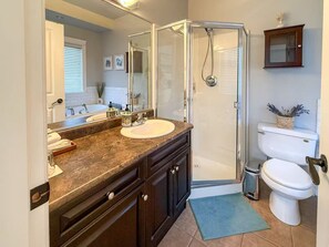 Jetted tub, hair dryer, towels, soap