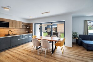 Deluxe Apartment | Living area | Heated floors