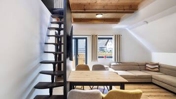 Signature-Apartment | Wohnbereich | Kinderspielzeug, Fußbodenheizung