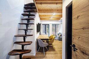 Superior Apartment, Mountain View | Living area | Toys, heated floors