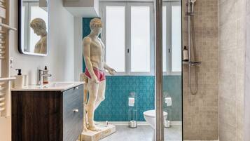 Shower, towels, soap, shampoo