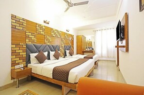 Family Triple Room, City View | Desk, laptop workspace, free WiFi