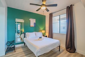 Executive Apartment, 1 Bedroom, Balcony, Pool View | Desk, laptop workspace, blackout drapes, iron/ironing board