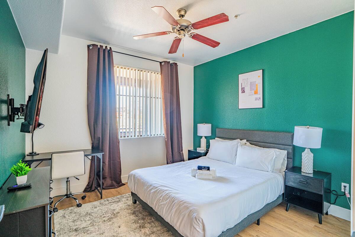 Premier Apartment, 1 Bedroom, Non Smoking, Pool View | Desk, laptop workspace, blackout drapes, iron/ironing board