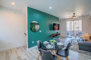 Luxury Apartment, 1 Bedroom, Non Smoking, Pool View | Living area | 55-inch Smart TV with digital channels