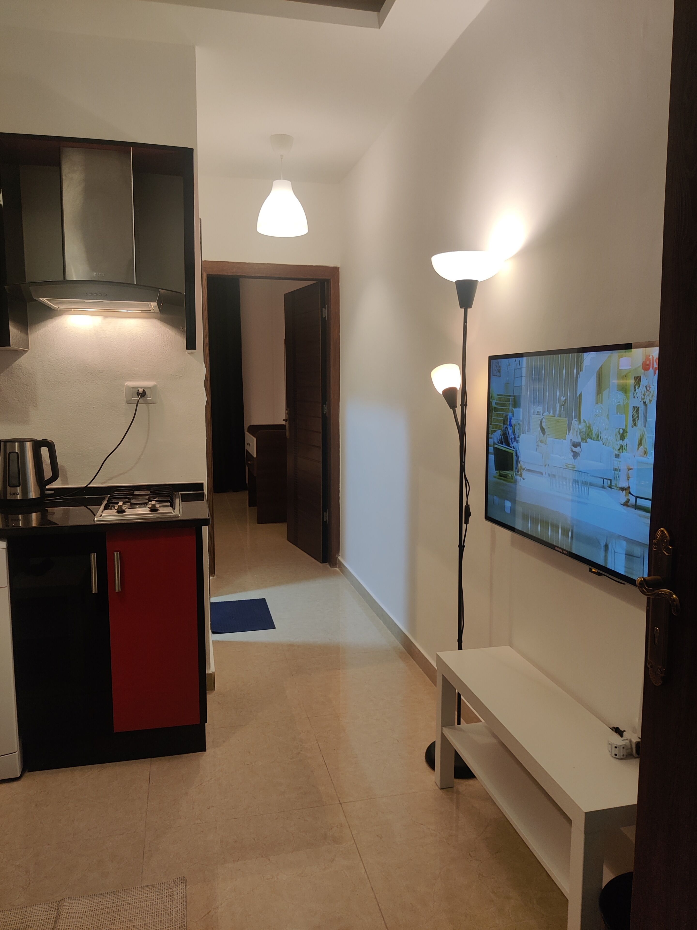 Apartment, 1 Bedroom, Accessible, Smoking | Living room | Flat-screen TV