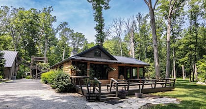 Rustic charm meets modern comfort in this hidden woodland cabin getaway
