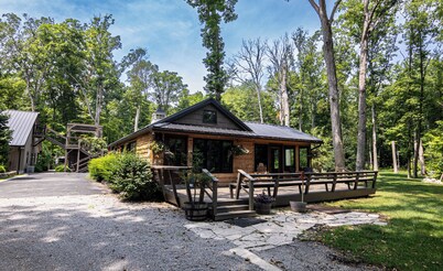 Rustic charm meets modern comfort in this hidden woodland cabin getaway