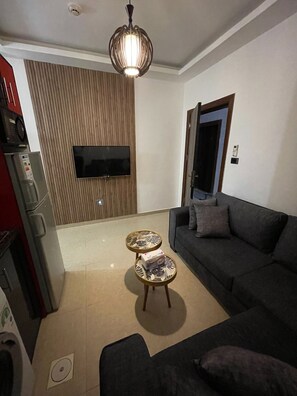Apartamento, 1 quarto, acessível | Sala de estar