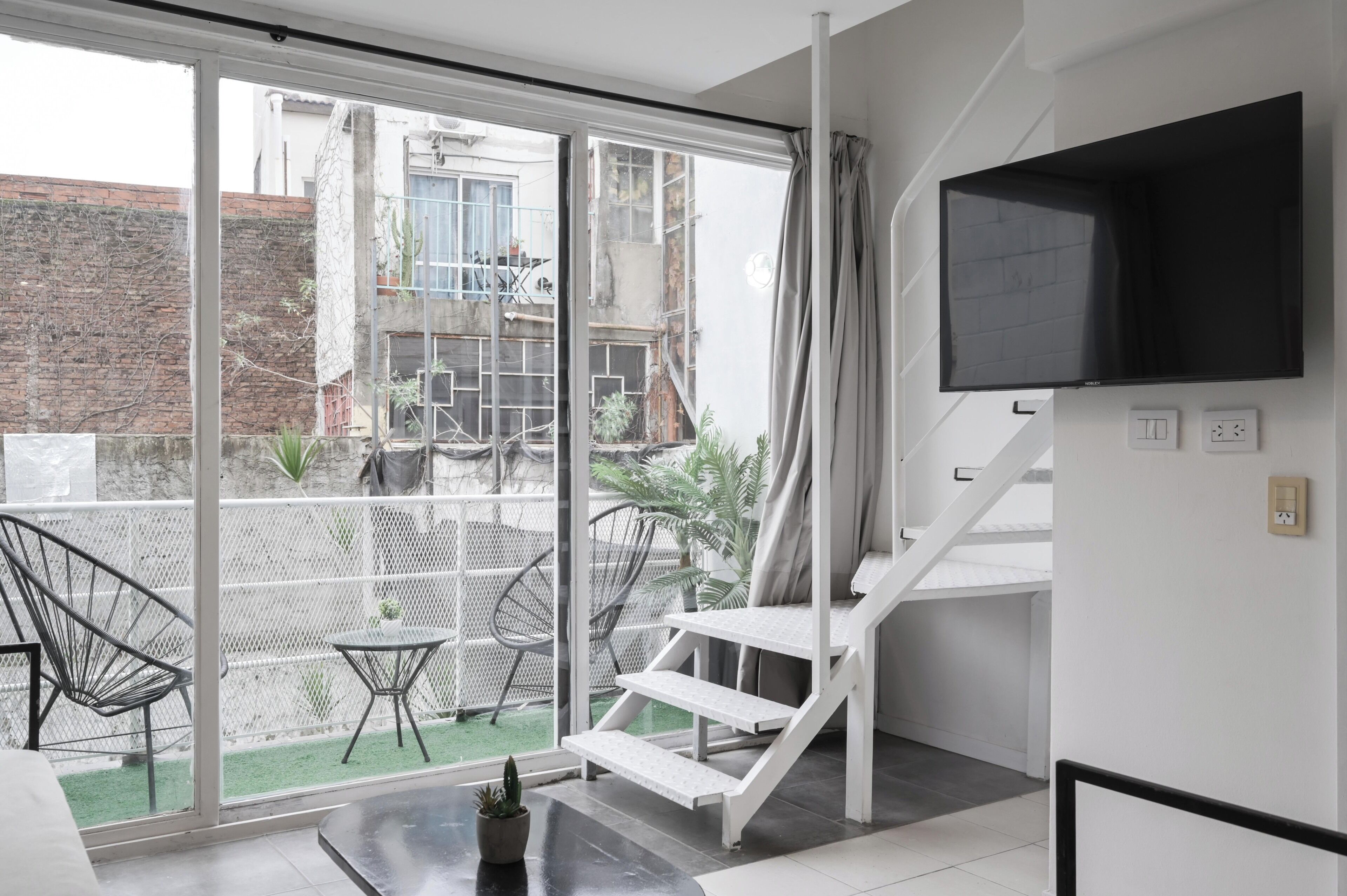 Apartamento, 2 quartos | Área de estar