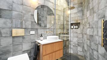 Shower, hair dryer, towels, soap