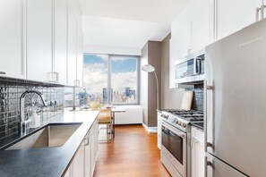 Fridge, electric kettle, toaster, lobster pot