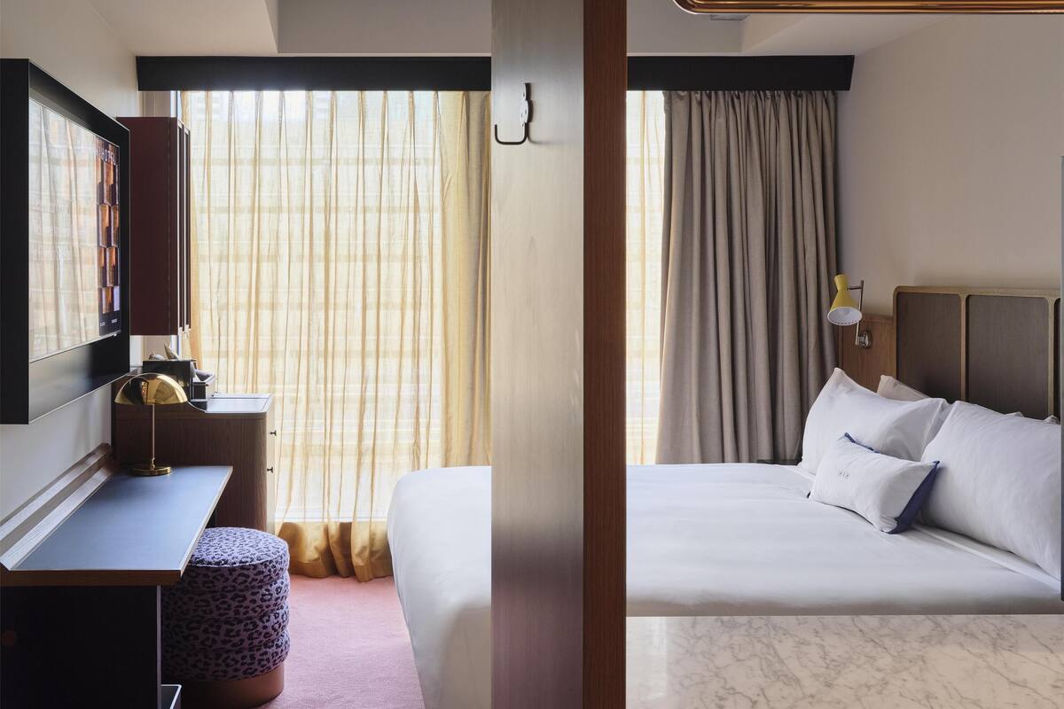 Local Room | Premium bedding, minibar, in-room safe, desk