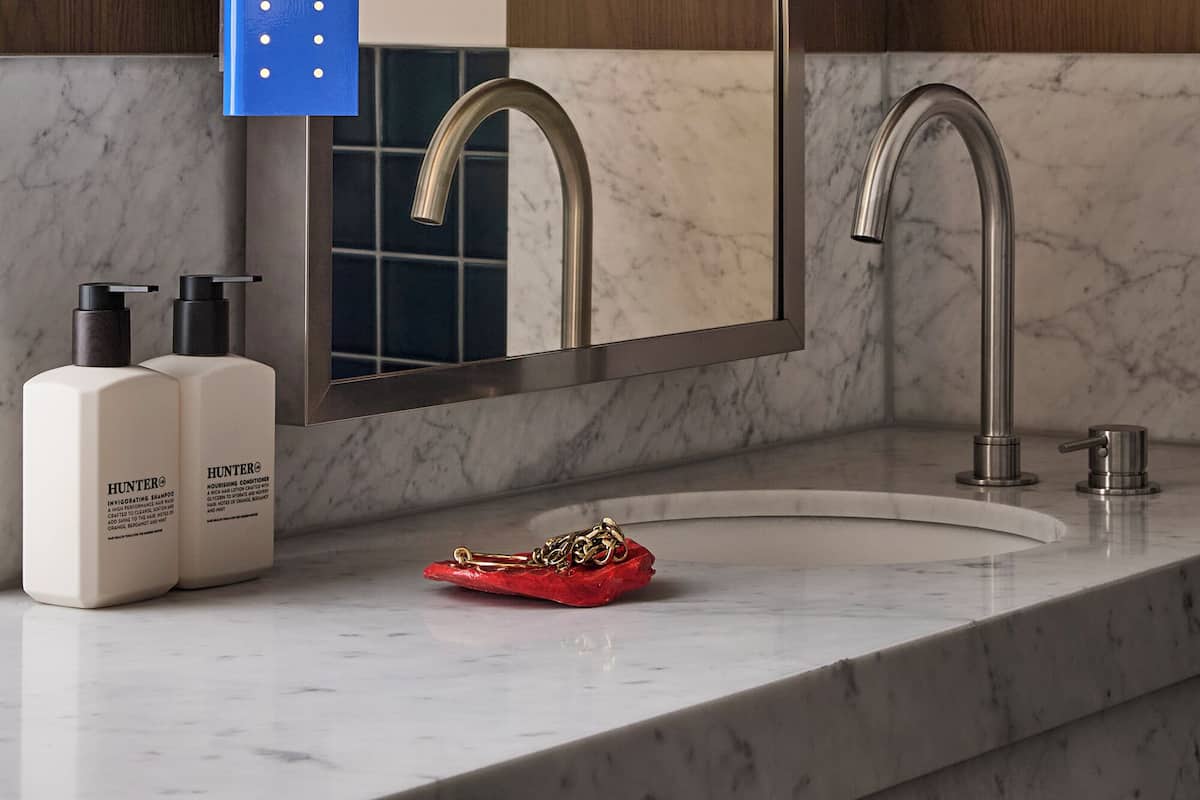Designer toiletries, hair dryer, bathrobes, slippers