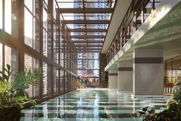 Indoor pool, open 7:00 AM to 9:00 PM, pool loungers