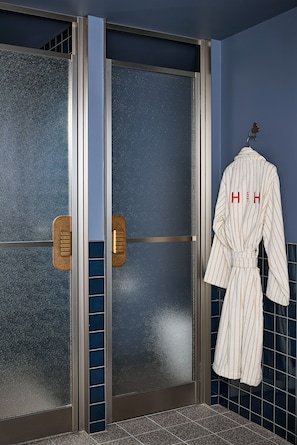 Designer toiletries, hair dryer, bathrobes, slippers