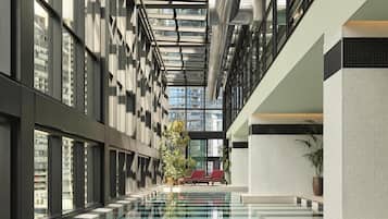 Indoor pool, open 6:00 AM to 11:00 PM, pool loungers