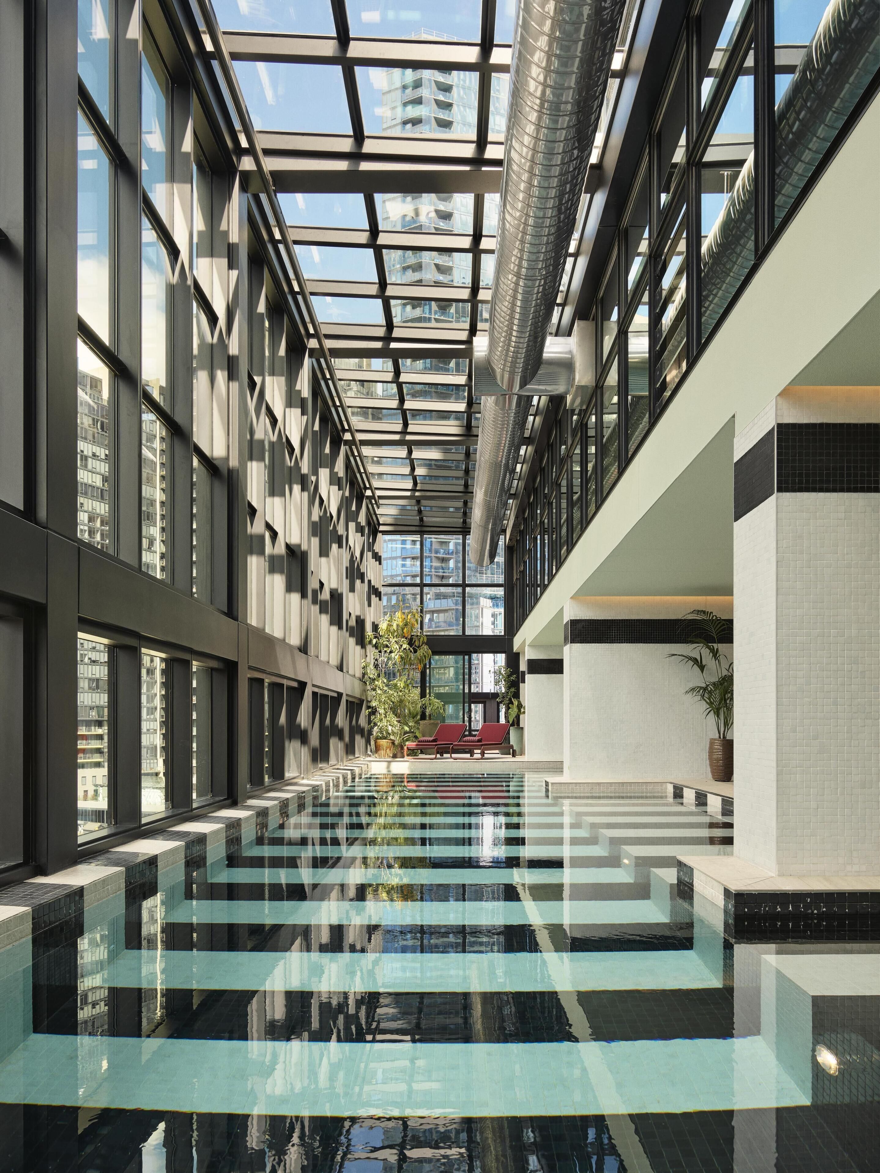 Indoor pool, open 6:00 AM to 11:00 PM, pool loungers