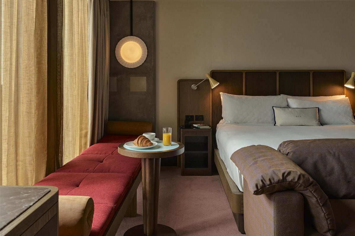 Explorer Room | Premium bedding, minibar, in-room safe, desk