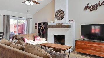 Smart TV, fireplace, DVD player, foosball